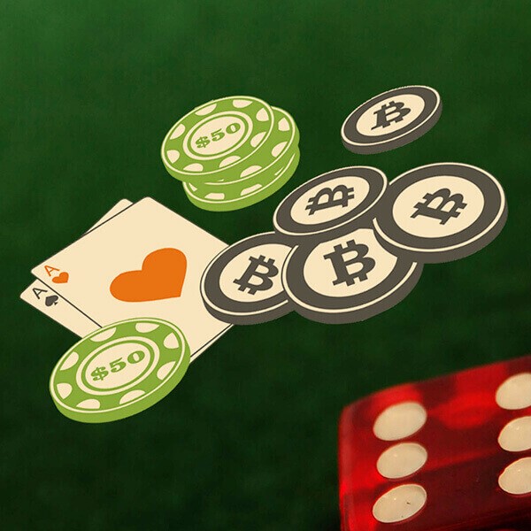 Pair of aces with a dice and bitcoin chips